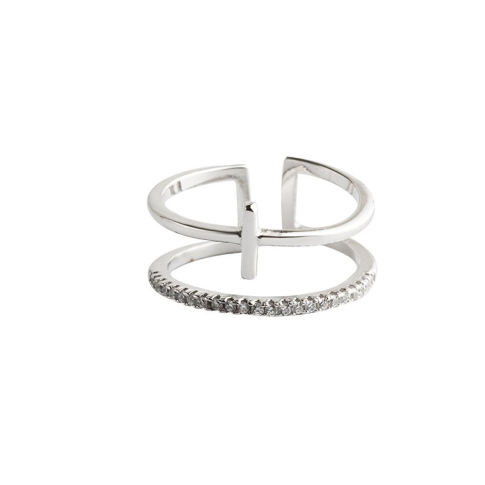 Half Eternity Pavé Ring with CZ Diamonds and a T design.